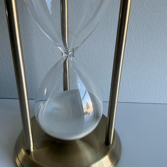 Brushed brass-tone hourglass with three columns glass with white sand 12.25” B2 - Picture 2 of 5
